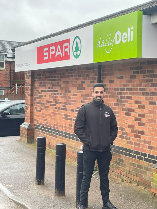 Outside SPAR Barlborough, with Minesh Keswala